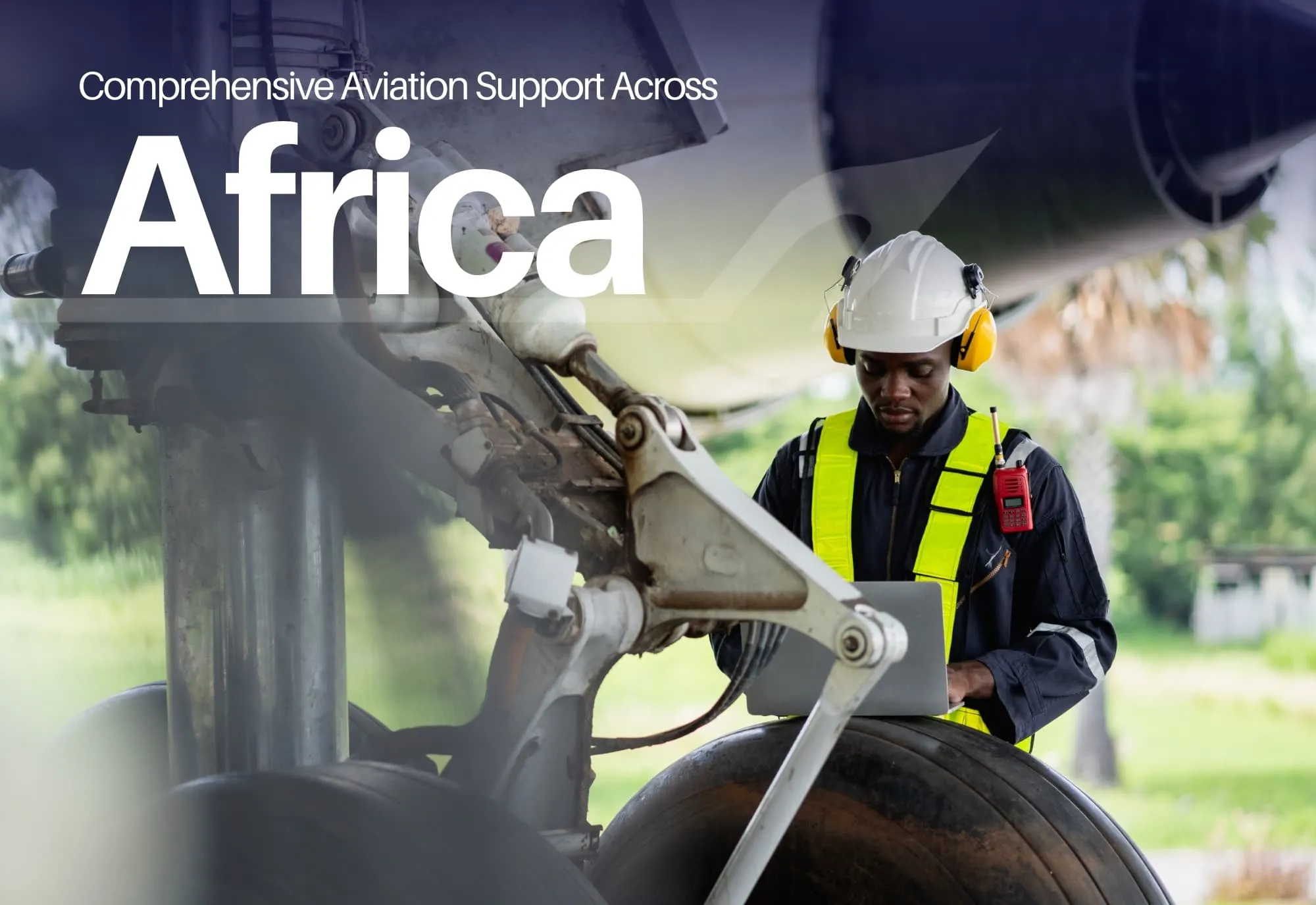 Aircraft engineer working on a laptop beside the landing gear: Comprehensive Aviation Support Across Africa